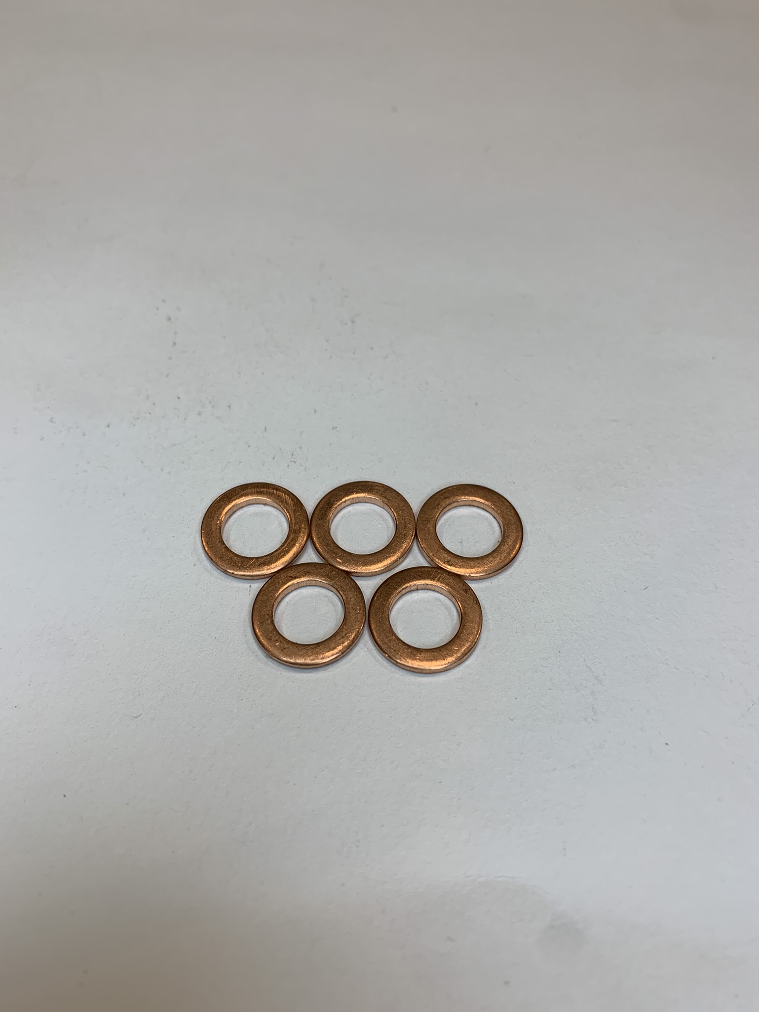ARRUELA TAMPA CABEÇOTE 6mm DE COBRE TITAN 150/ FAN 150/ BIZ 100 Aplicação VEDAÇAO: TITAN 150/FAN 150/BIZ 100 13.../POP 100 - Distribuidora Atitude